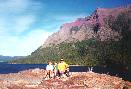 The family at Sun Point with St Mary Lake & Red Eagle in the backround